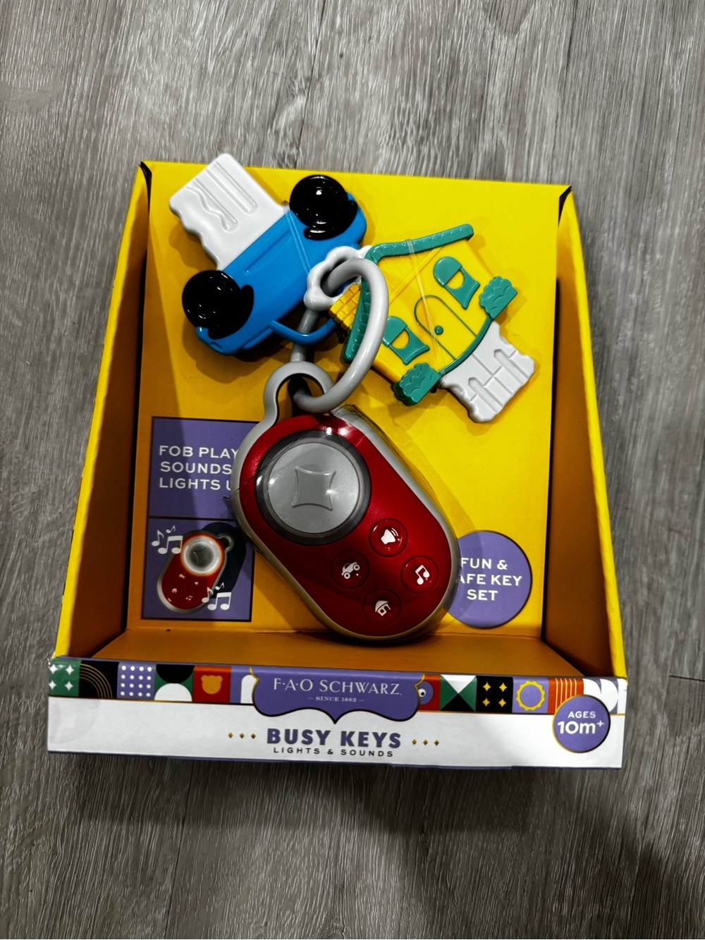 FAO Schwarz Busy Keys Playset - Red Main Fob with Blue, Yellow & White Charms